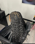 small knotless braids done with synthetic boho braids
